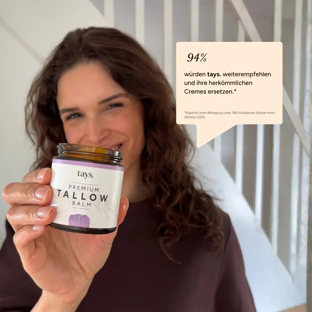 Lächelnde Frau nach der Nutzung von tays Rindertalg Creme